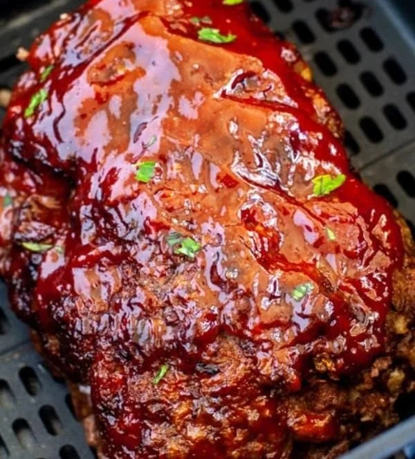 Delicious air fryer meatloaf ready to serve, showcasing its juicy texture and rich flavor.