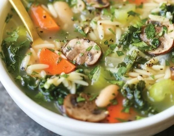 Detox Chicken Soup with fresh vegetables in a bowl