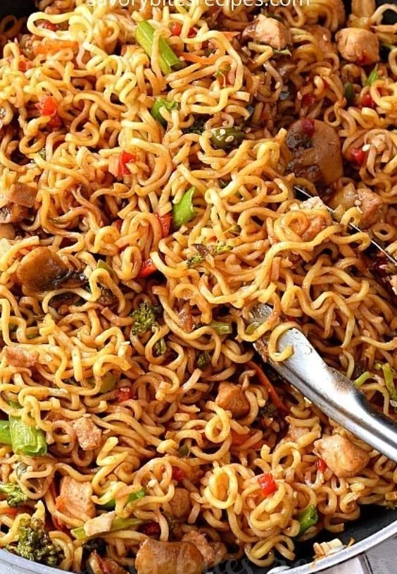 Easy chicken ramen noodle stir fry recipe with colorful vegetables.