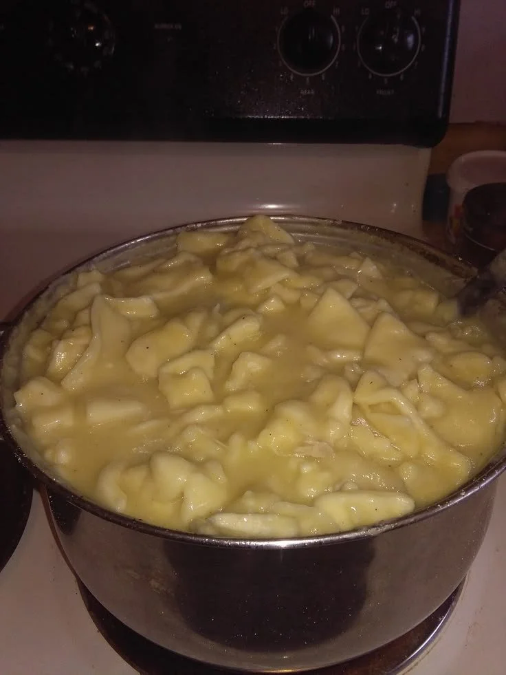 Grandma's delicious chicken and dumplings recipe with fluffy traditional dumplings.