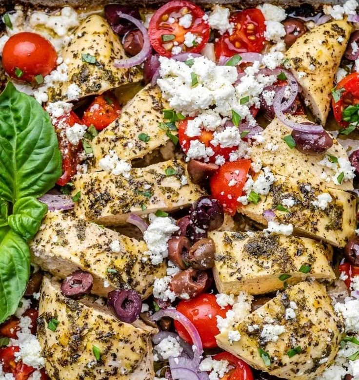 Greek baked chicken breast topped with feta cheese and herbs