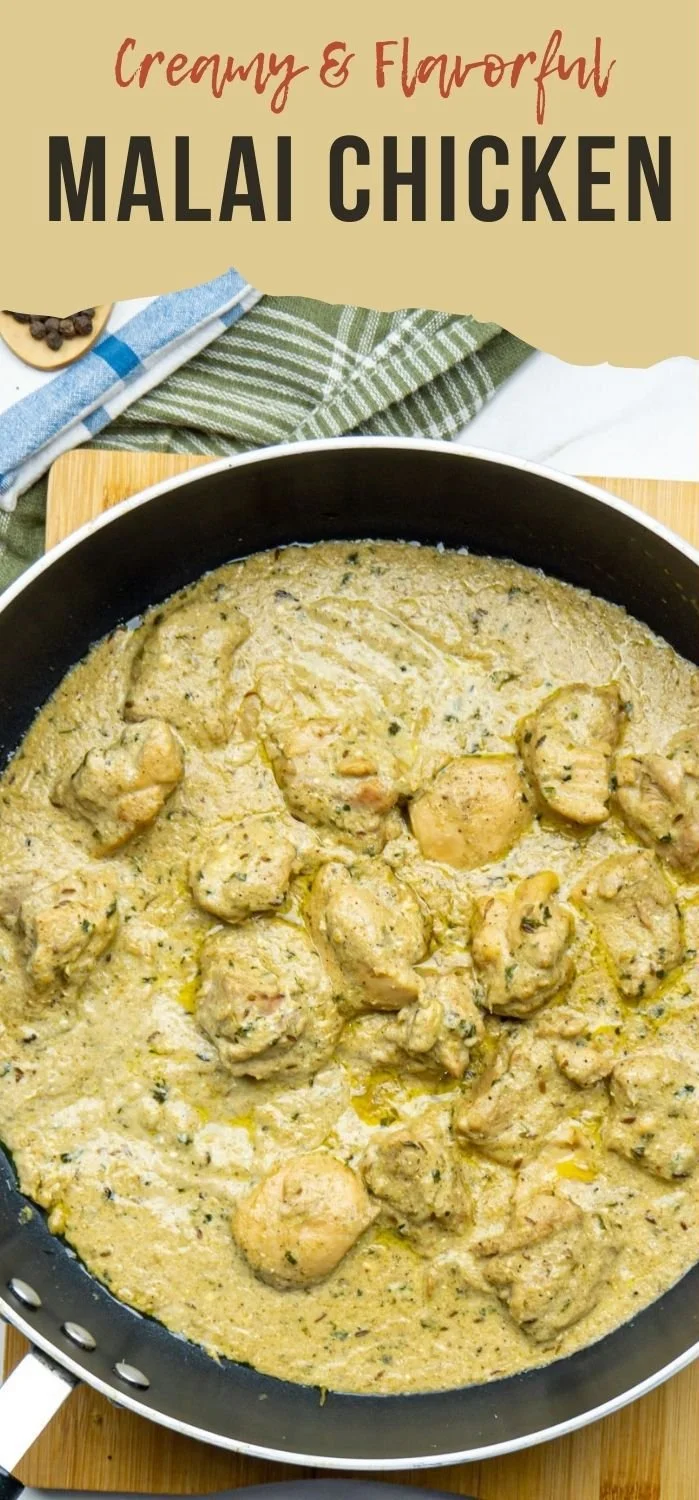 Creamy Malai Chicken Curry served with rice and garnished with cilantro