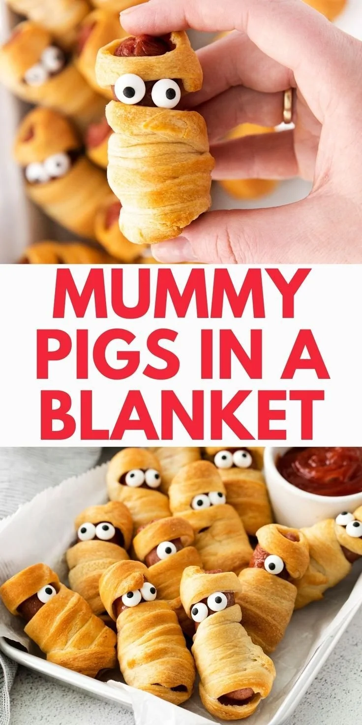 Halloween-themed mummy pigs in a blanket served as a fun snack