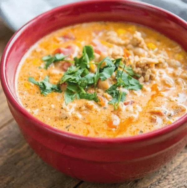 Bowl of delicious Slow Cooker Buffalo Chicken Chili topped with green onions.