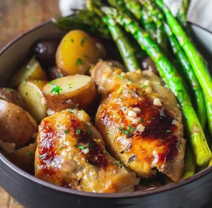Slow-cooker lemon chicken garnished with herbs and served on a plate