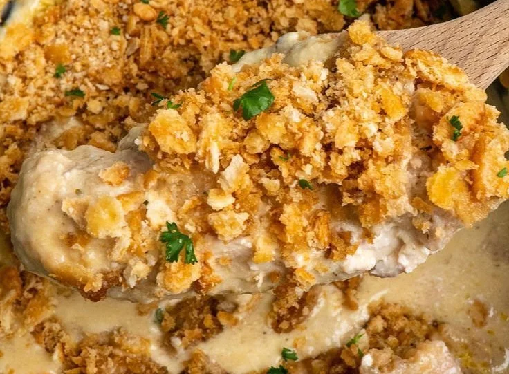 Slow Cooker Ritz Cracker Chicken recipe served on a plate with sides.