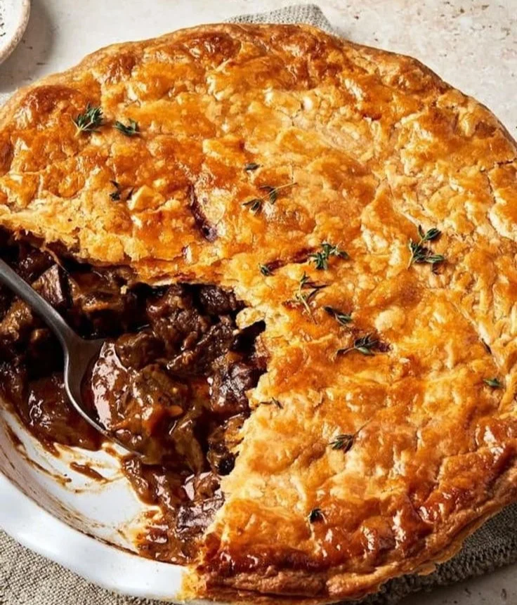 Delicious homemade steak pie with flaky pastry and tender beef filling