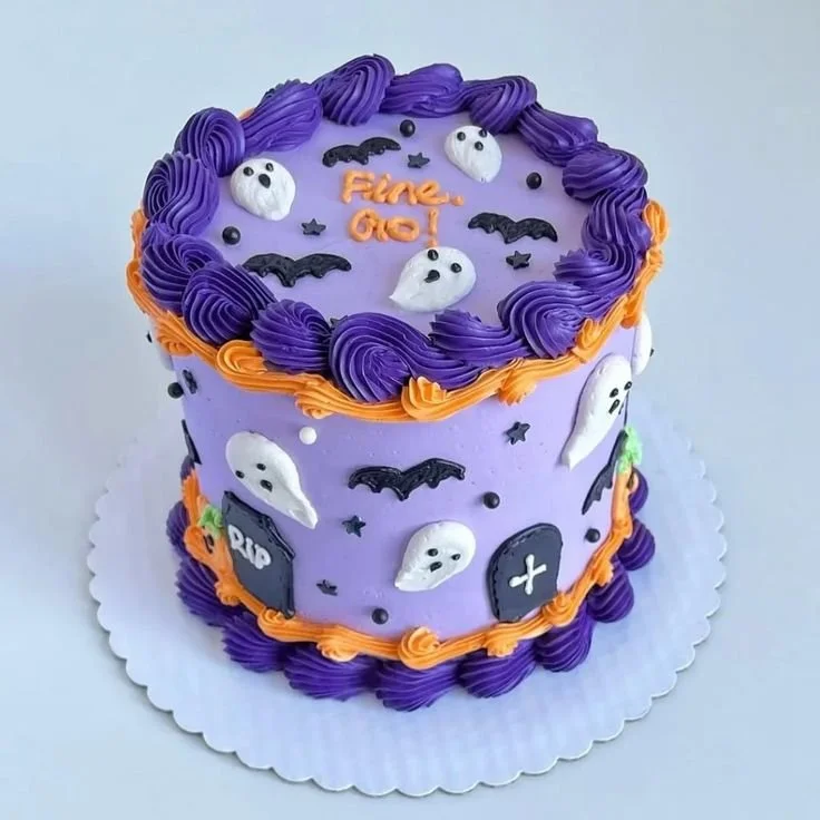 Unique Halloween birthday cake with spooky decorations and festive colors