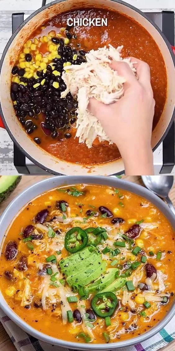 Creamy chicken enchilada soup in a bowl with garnishes