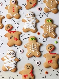 Halloween themed gingerbread men cookies with festive decorations