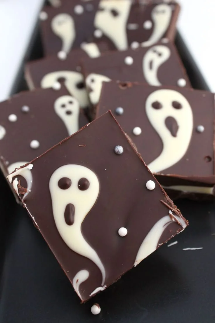 Adorable Halloween sweets displayed in fun shapes and colors for festive celebrations.