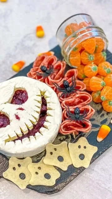 Oogie Boogie charcuterie board featuring Jack Skellington cheese for Halloween