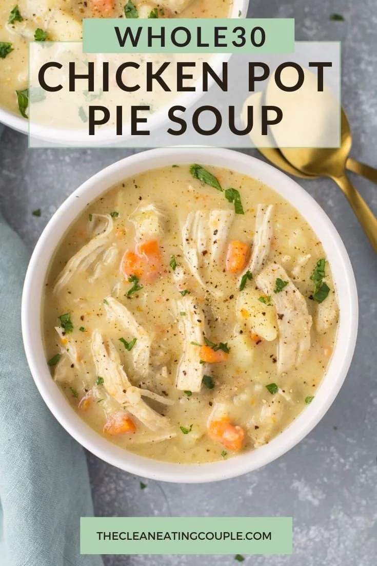 Bowl of Whole30 Chicken Pot Pie Soup with vegetables and herbs